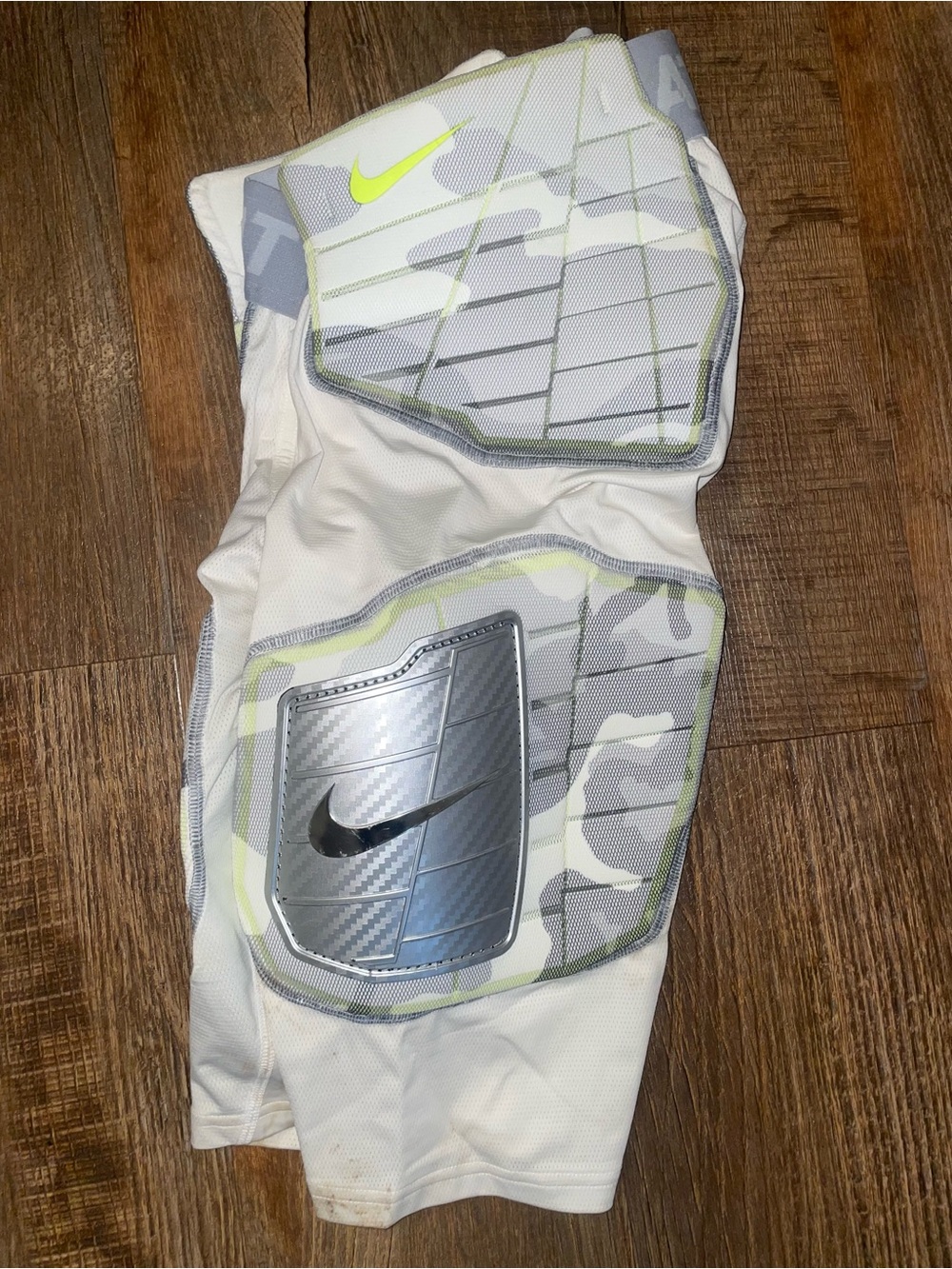 Nike White Camo Padded Football Shorts with Neon Accent